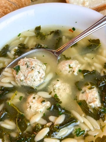 italian wedding soup with meatballs, orzo, and kale
