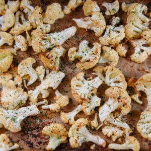 roasted cauliflower with golden brown florets and sprinkled with parsley